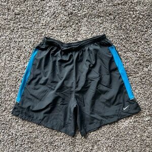 Nike Dark Gray Athletic Shorts with Blue Side Panels